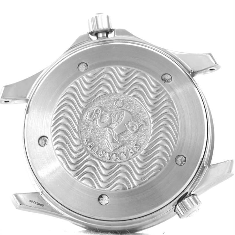 The image shows the back case of an Omega Seamaster 2255.80.00 Men
s Stainless Steel Blue Dial 2255.80.00 Men
s Stainless Steel Blue Dial watch, focusing on its engraved emblem and crown from a bottom view angle.