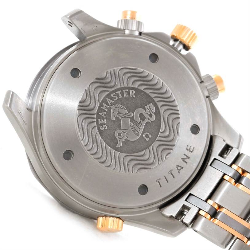 This image shows the case back and bracelet of an Omega Seamaster 2296.80.00 Men's Titanium Blue Dial 2296.80.00 Men's Titanium Blue Dial watch, highlighting the "Seamaster" engraving and "Titane" marking.