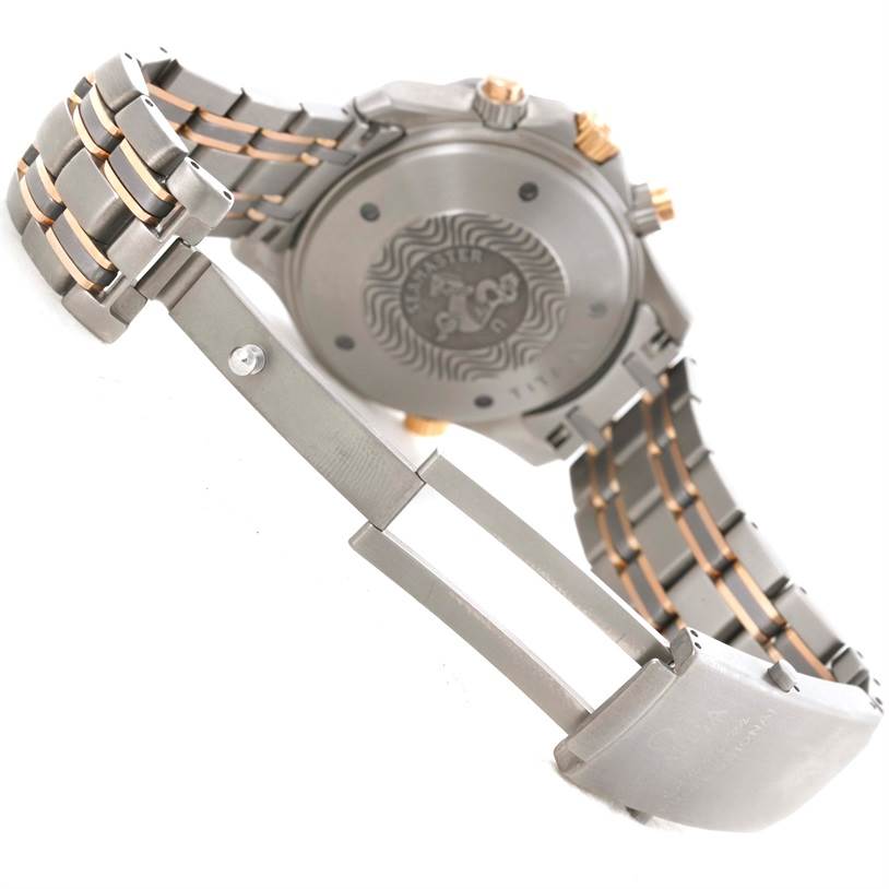 The image shows the back case, clasp, and part of the bracelet of an Omega Seamaster 2296.80.00 Men's Titanium Blue Dial 2296.80.00 Men's Titanium Blue Dial watch.