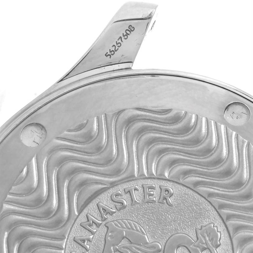 The image shows a close-up of the back case of an Omega Seamaster 2561.80.00 Men
s Stainless Steel Blue Dial 2561.80.00 Men
s Stainless Steel Blue Dial watch, highlighting the engraved serial number and logo.