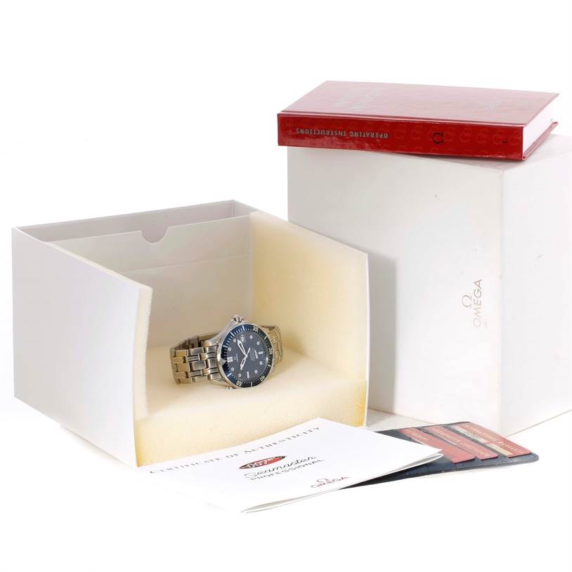 The Omega Seamaster 2537.80.00 Men
s Stainless Steel Blue Dial 2537.80.00 Men
s Stainless Steel Blue Dial watch is displayed at an angle inside its box, accompanied by an instruction manual and Best Quality
ity cards.