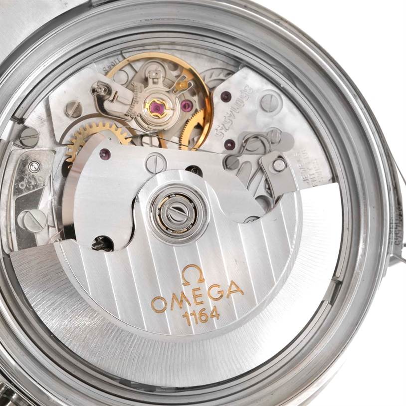 The image shows a close-up, top-down view of the movement of an Omega Seamaster 213.30.42.40.01.001 Men
s Stainless Steel Black Dial 213.30.42.40.01.001 Men
s Stainless Steel Black Dial watch.
