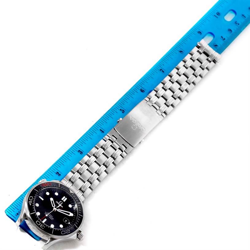 The Omega Seamaster 212.30.41.20.01.005 Men
s Stainless Steel Black Dial 212.30.41.20.01.005 Men
s Stainless Steel Black Dial watch is shown flat with its metal bracelet, ruler for scale, and part of the clasp visible.