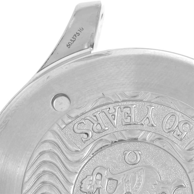 The image shows a close-up of the back of an Omega Seamaster 2534.50.00 Men
s Stainless Steel Black Dial 2534.50.00 Men
s Stainless Steel Black Dial watch case, highlighting part of the engraved logo and serial number.