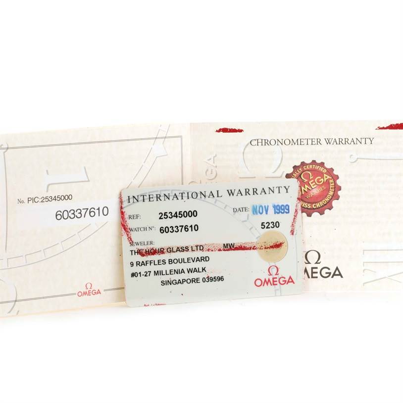 The image shows the international warranty card and chronometer warranty paperwork for an Omega Seamaster 2534.50.00 Men
s Stainless Steel Black Dial 2534.50.00 Men
s Stainless Steel Black Dial watch, dated November 1999.