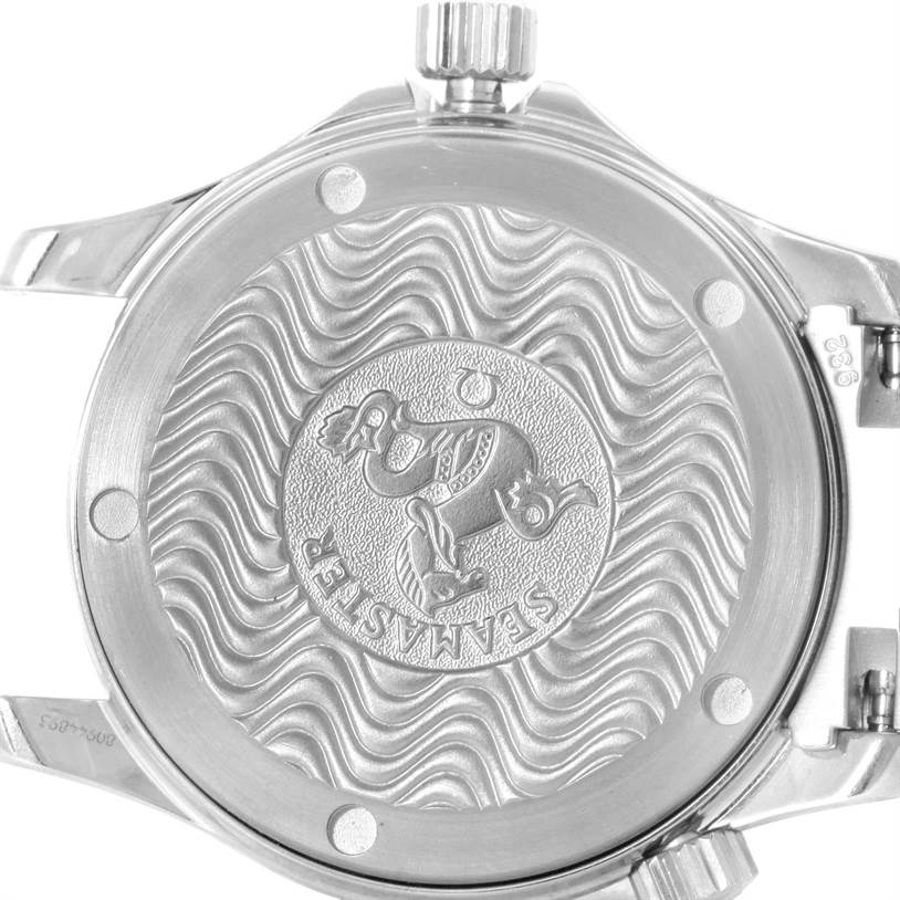 This image shows the case back of an Omega Seamaster 2252.50.00 Men
s Stainless Steel Black Dial 2252.50.00 Men
s Stainless Steel Black Dial watch, displaying its engraved logo and wavy pattern from a flat angle.