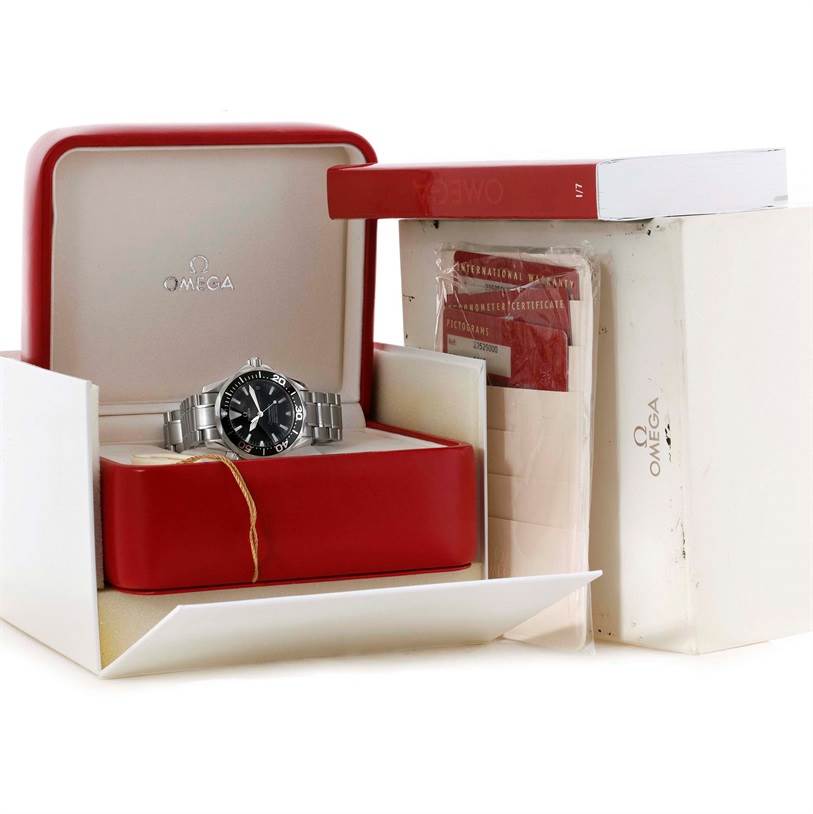 The Omega Seamaster 2252.50.00 Men
s Stainless Steel Black Dial 2252.50.00 Men
s Stainless Steel Black Dial watch is shown at an angle inside its red watch box, along with associated packaging and documents.