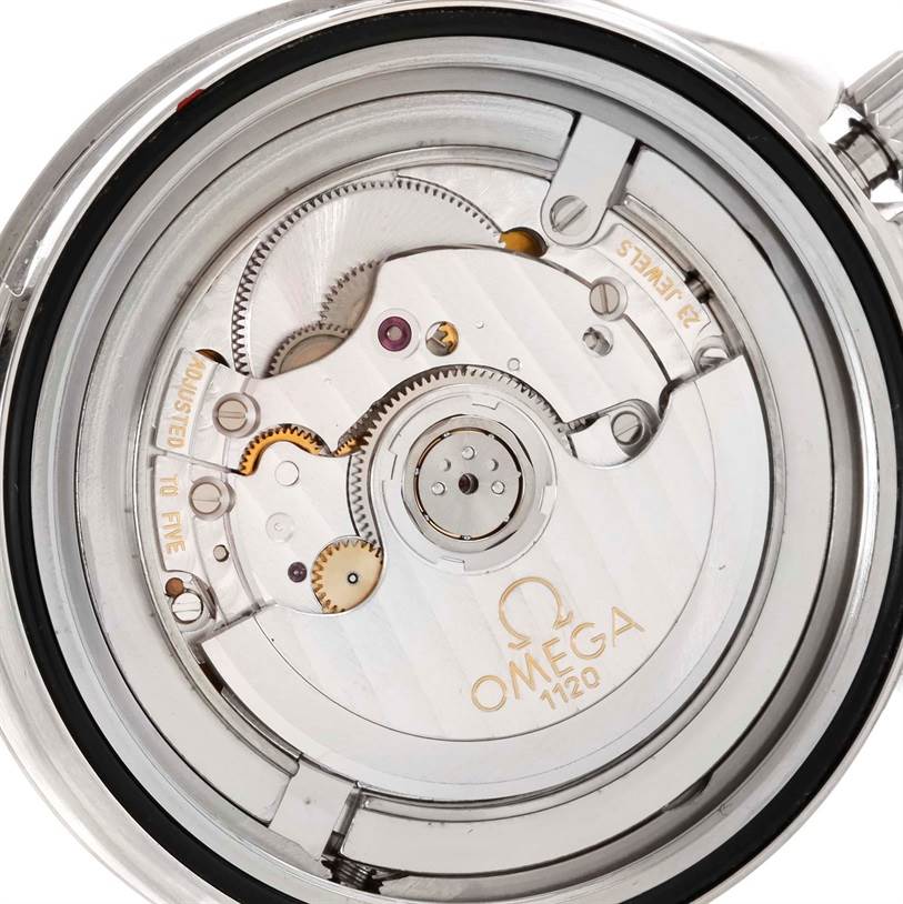 This image shows a detailed view of the Omega Seamaster 2531.80.00 Men
s Stainless Steel Blue Dial 2531.80.00 Men
s Stainless Steel Blue Dial
s movement, specifically the Omega 1120 caliber mechanism.