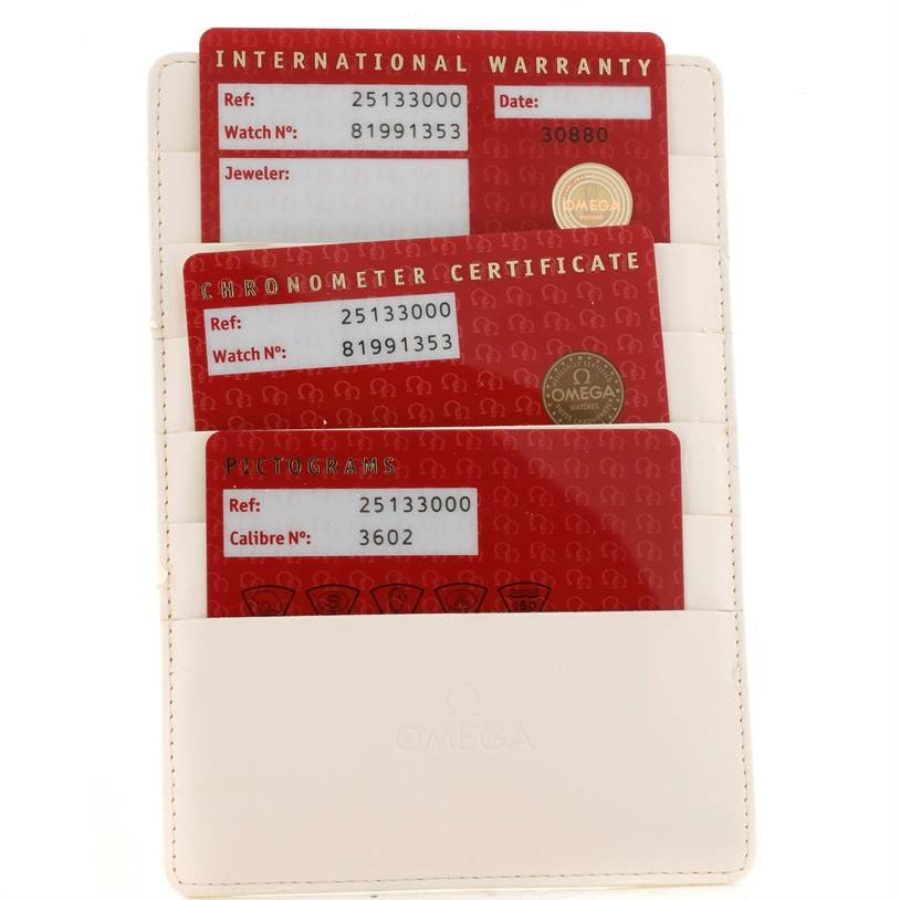 The image shows warranty cards and certificates for an Omega Seamaster 2513.30.00 Men
s Stainless Steel Silver Dial 2513.30.00 Men
s Stainless Steel Silver Dial watch, contained within a white cardholder.