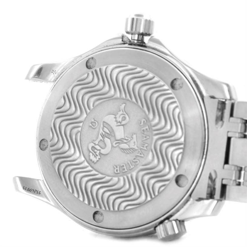 This image shows the back case of an Omega Seamaster 2561.80.00 Men
s Stainless Steel Blue Dial 2561.80.00 Men
s Stainless Steel Blue Dial watch, highlighting the wavy design and engraved emblem.