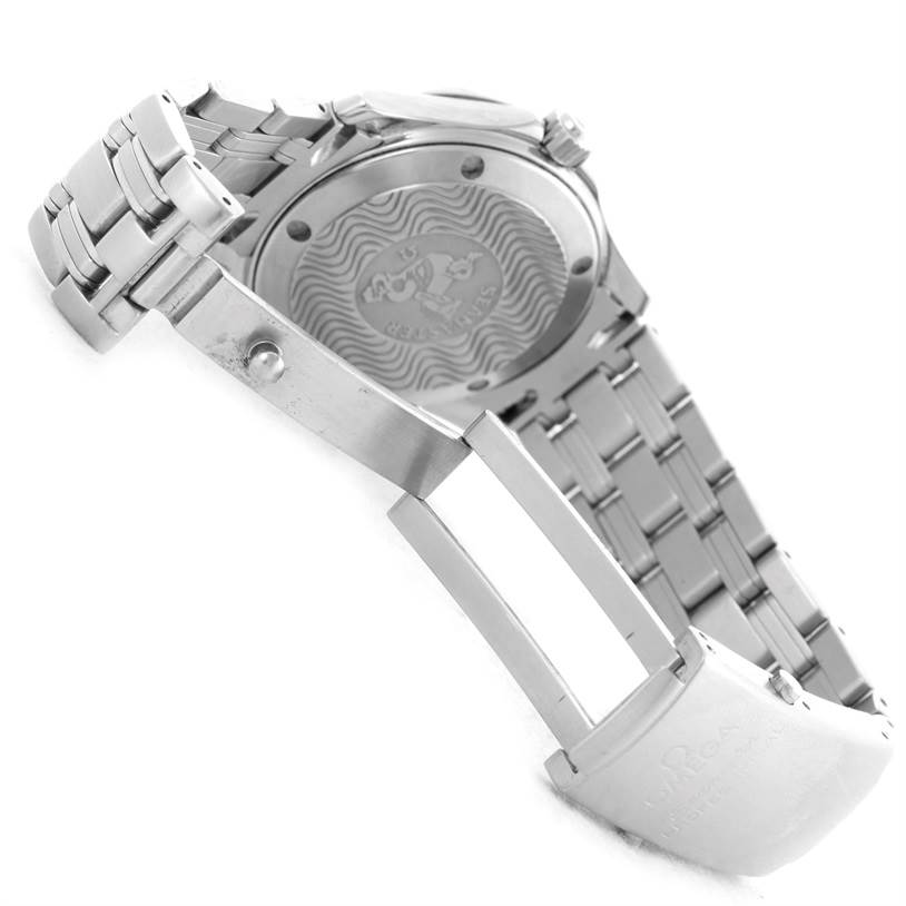 The image shows the back of the Omega Seamaster 2561.80.00 Men
s Stainless Steel Blue Dial 2561.80.00 Men
s Stainless Steel Blue Dial watch and its opened metal bracelet clasp.