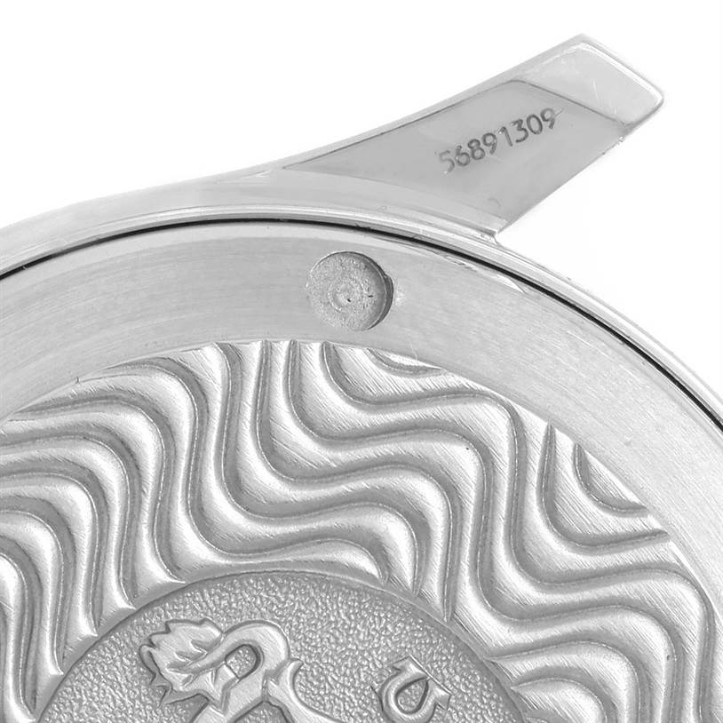 The image shows a close-up of the case back of an Omega Seamaster 2561.80.00 Men
s Stainless Steel Blue Dial 2561.80.00 Men
s Stainless Steel Blue Dial watch, highlighting the serial number and wave pattern.