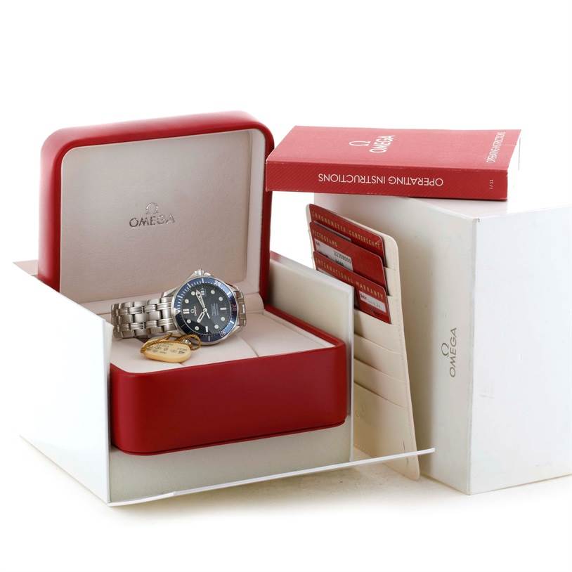 The Omega Seamaster 2220.80.00 Men
s Stainless Steel Blue Dial 2220.80.00 Men
s Stainless Steel Blue Dial watch is shown in its open red box, accompanied by an instruction booklet and warranty cards. 