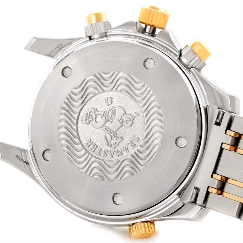 The image shows the case back of an Omega Seamaster 2398.20.00 Men's Steel and Gold (two tone) White Dial 2398.20.00 Men's Steel and Gold (two tone) White Dial watch, featuring engravings and part of the bracelet.