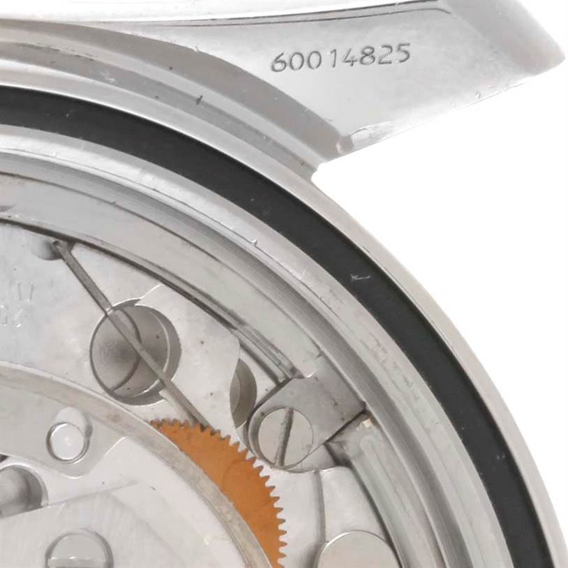 This image shows the internal mechanism and part of the case back of the Omega Seamaster 2598.80.00 Men
s Stainless Steel Blue Dial 2598.80.00 Men
s Stainless Steel Blue Dial watch at a close angle.