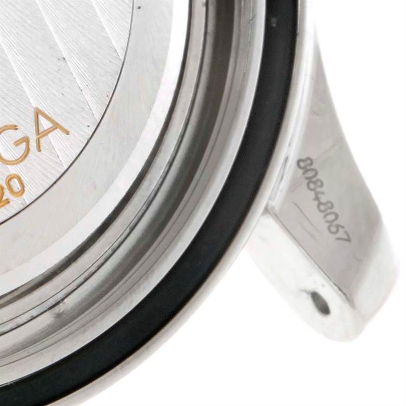 This image shows the back of the Omega Seamaster 2551.80.00 Men
s Stainless Steel Blue Dial 2551.80.00 Men
s Stainless Steel Blue Dial watch case, focusing on the seal and part of the serial number.