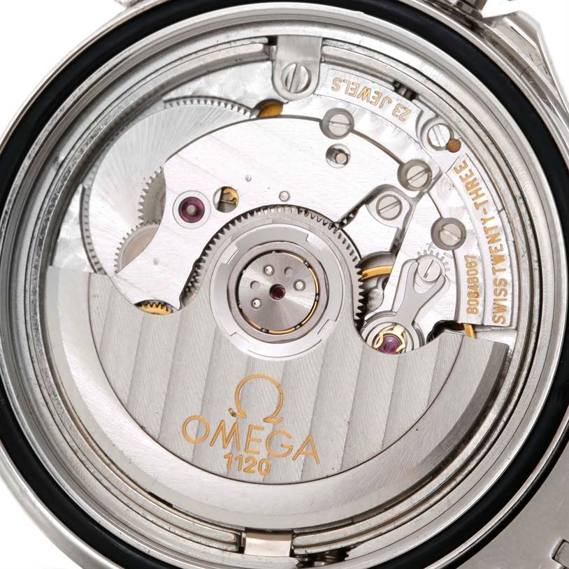The image shows a close-up of the movement and internal mechanism of an Omega Seamaster 2551.80.00 Men
s Stainless Steel Blue Dial 2551.80.00 Men
s Stainless Steel Blue Dial watch.