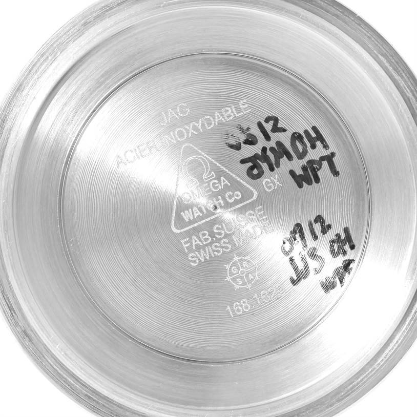 This image shows the interior of the case back of an Omega Seamaster 2531.80.00 Men
s Stainless Steel Blue Dial 2531.80.00 Men
s Stainless Steel Blue Dial watch with various inscriptions and engravings.