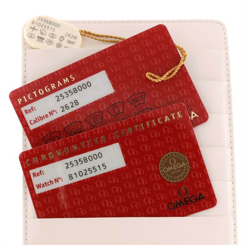 The image shows cards and a tag with references and certifications for an Omega Seamaster 2535.80.00 Men
s Stainless Steel Blue Dial 2535.80.00 Men
s Stainless Steel Blue Dial watch.