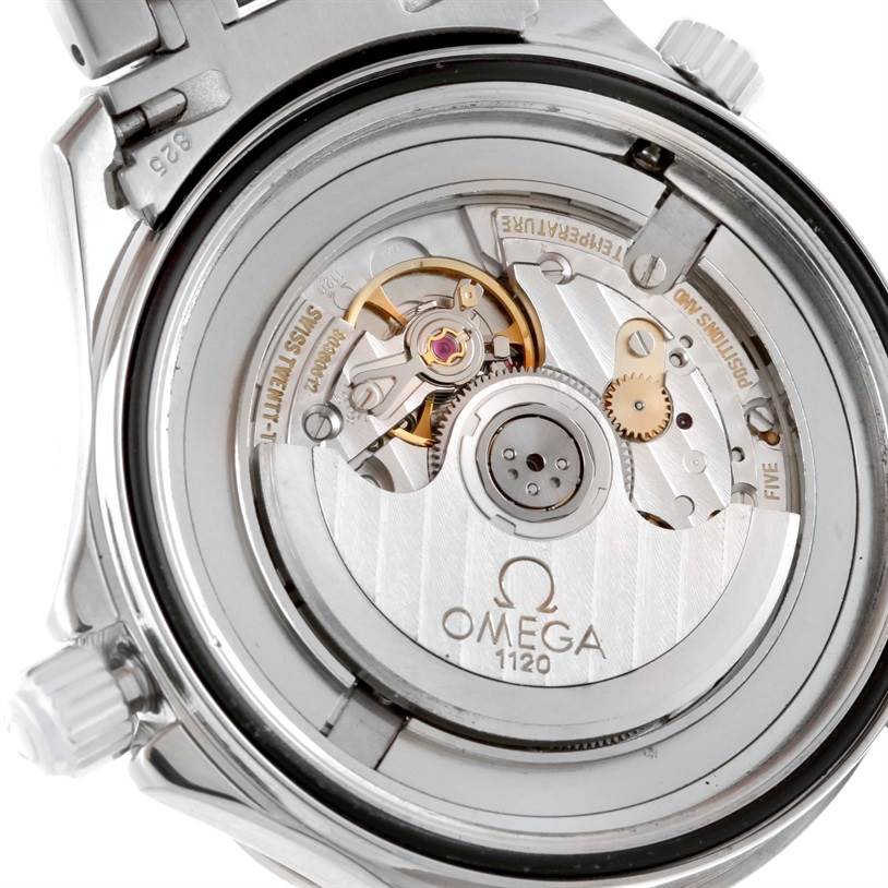 The image shows the backside of the Omega Seamaster 2531.80.00 Men
s Stainless Steel Blue Dial 2531.80.00 Men
s Stainless Steel Blue Dial watch, highlighting the inner mechanisms and movement parts.