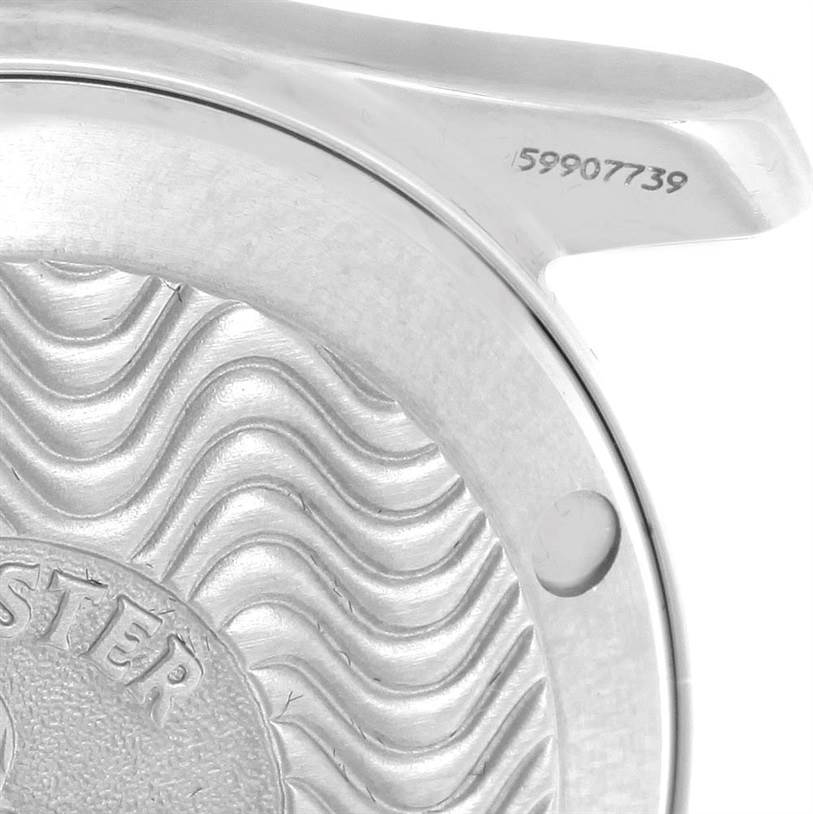 This image shows the case back of an Omega Seamaster 2561.80.00 Men
s Stainless Steel Blue Dial 2561.80.00 Men
s Stainless Steel Blue Dial watch, focusing on the serial number and wave pattern.