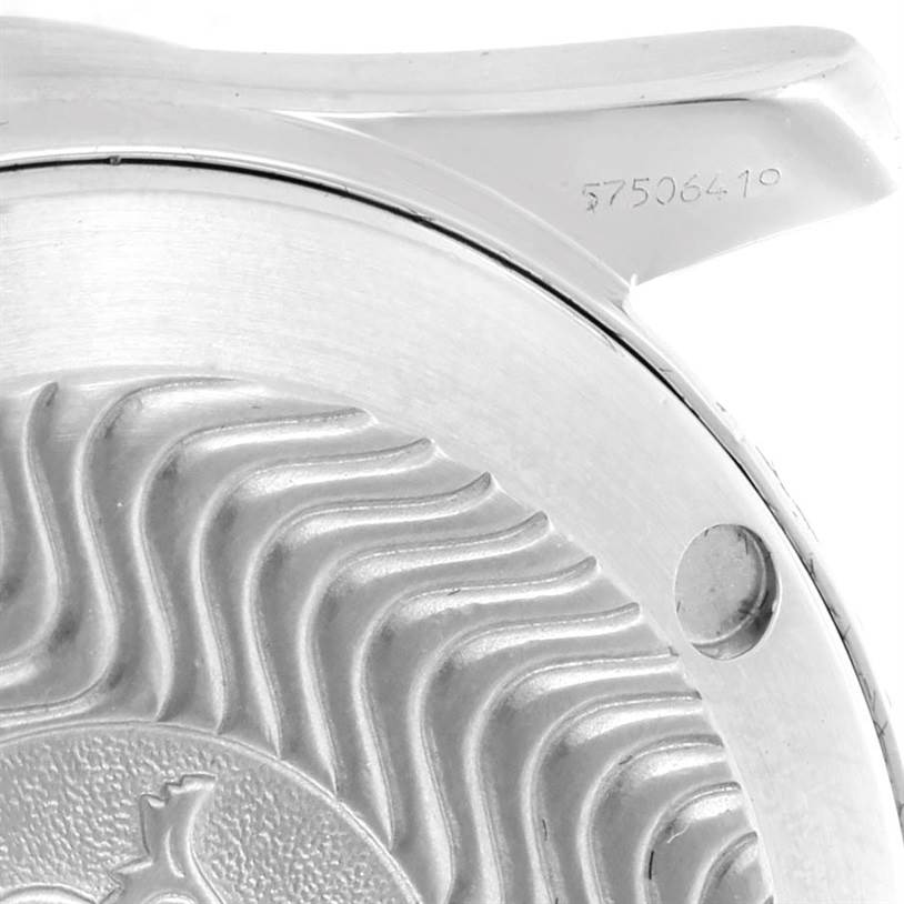 The image shows a close-up of the case back and part of the lug with a serial number of an Omega Seamaster 2561.80.00 Men
s Stainless Steel Blue Dial 2561.80.00 Men
s Stainless Steel Blue Dial watch.