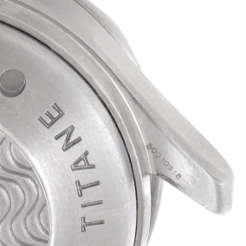 This image shows a close-up of the case back and part of the strap lug of an Omega Seamaster 2298.80.00 Men
s Titanium Blue Dial 2298.80.00 Men
s Titanium Blue Dial watch.