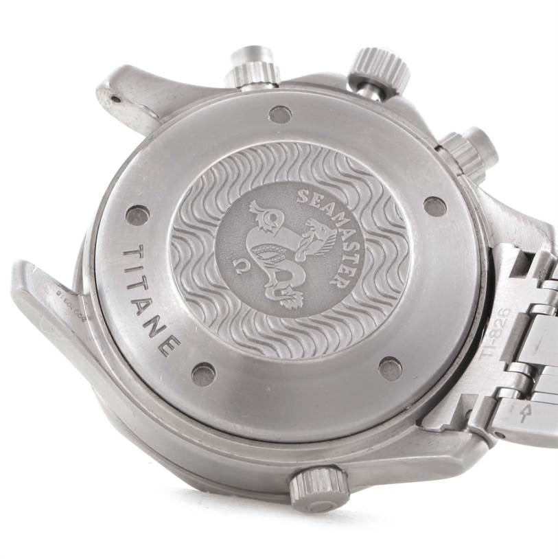 This image shows the back case of the Omega Seamaster 2298.80.00 Men
s Titanium Blue Dial 2298.80.00 Men
s Titanium Blue Dial watch, highlighting the "Titane" engraving and screw-down crown.