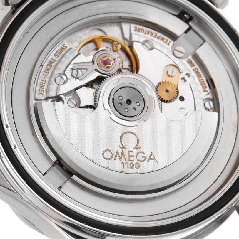 The image shows a close-up of the back of an Omega Seamaster 2254.50.00 Men
s Stainless Steel Black Dial 2254.50.00 Men
s Stainless Steel Black Dial watch, focusing on its movement and inner mechanical parts.