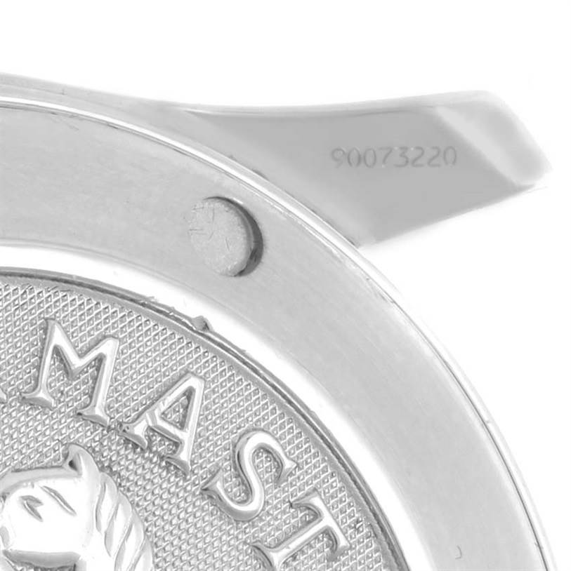 This close-up image shows the engraved back case and part of a lug of an Omega Seamaster 2223.80.00 Men
s Stainless Steel Blue Dial 2223.80.00 Men
s Stainless Steel Blue Dial watch.
