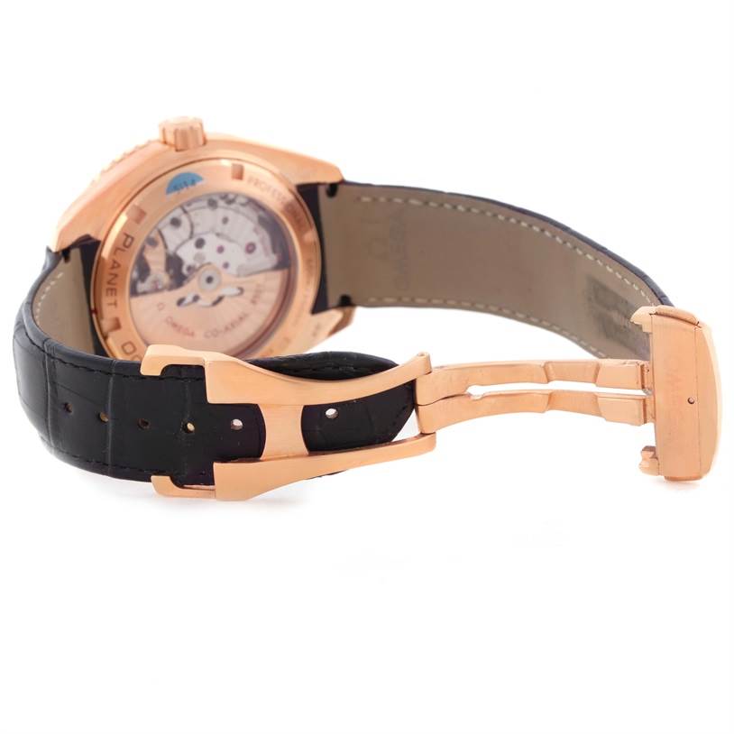 The image shows the case back and deployment clasp of an Omega Seamaster 232.63.46.21.01.001 Men
s Black Dial 232.63.46.21.01.001 Men
s Black Dial watch, with a part of the strap visible.