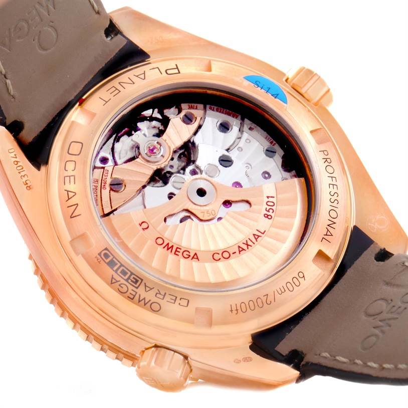 The image shows the back casing of the Omega Seamaster 232.63.46.21.01.001 Men
s Black Dial 232.63.46.21.01.001 Men
s Black Dial, highlighting the intricate movement mechanism and the CO-AXIAL 8501 label.