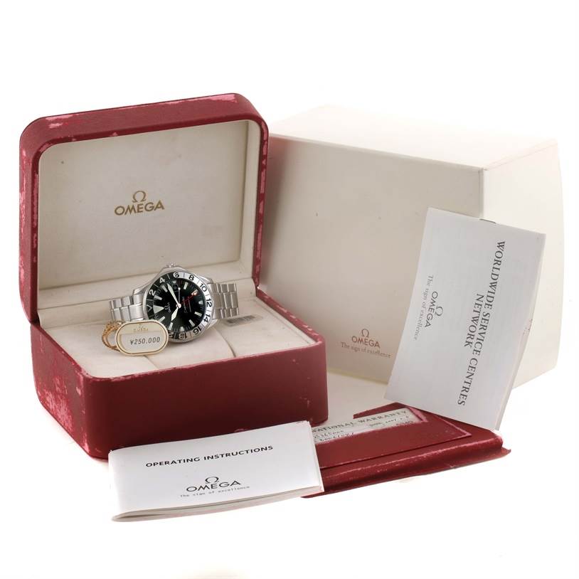 The image shows an Omega Seamaster 2536.50.00 Men
s Stainless Steel Black Dial 2536.50.00 Men
s Stainless Steel Black Dial watch in its box, with operating instructions and service booklet.