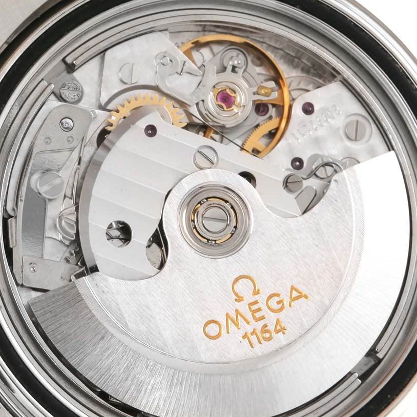 This image shows a close-up of the Omega Seamaster 2599.80.00 Men
s Stainless Steel Blue Dial 2599.80.00 Men
s Stainless Steel Blue Dial
s movement, highlighting the internal gears and mechanical parts.