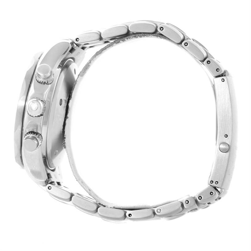 The image shows a side view of an Omega Seamaster 2599.80.00 Men
s Stainless Steel Blue Dial 2599.80.00 Men
s Stainless Steel Blue Dial watch, highlighting the crown, pushers, and stainless steel bracelet.