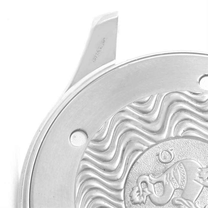 This close-up image shows part of the back case of an Omega Seamaster 2254.50.00 Men
s Stainless Steel Black Dial 2254.50.00 Men
s Stainless Steel Black Dial watch, featuring the unique wavy engraving and emblem.