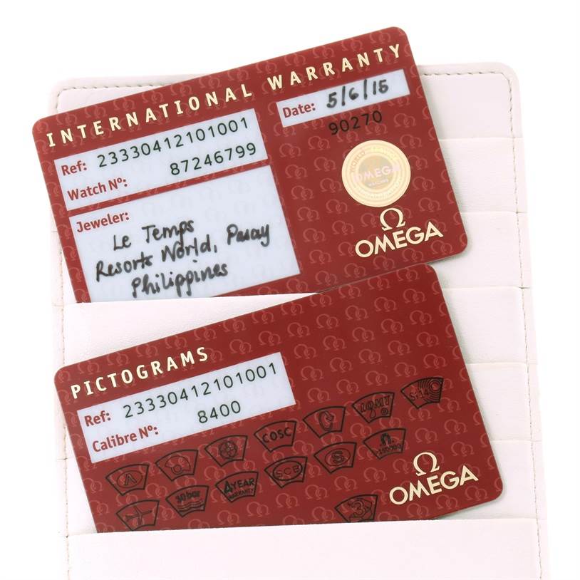 The image shows the international warranty and pictograms cards for an Omega Seamaster 233.30.41.21.01.001 Stainless Steel Black Dial 233.30.41.21.01.001 Stainless Steel Black Dial watch.