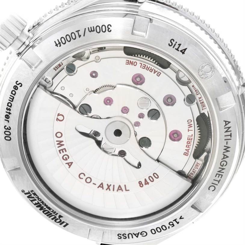 The image shows the back view of the Omega Seamaster 233.30.41.21.01.001 Stainless Steel Black Dial 233.30.41.21.01.001 Stainless Steel Black Dial 300, focusing on its co-axial movement and internal mechanisms.