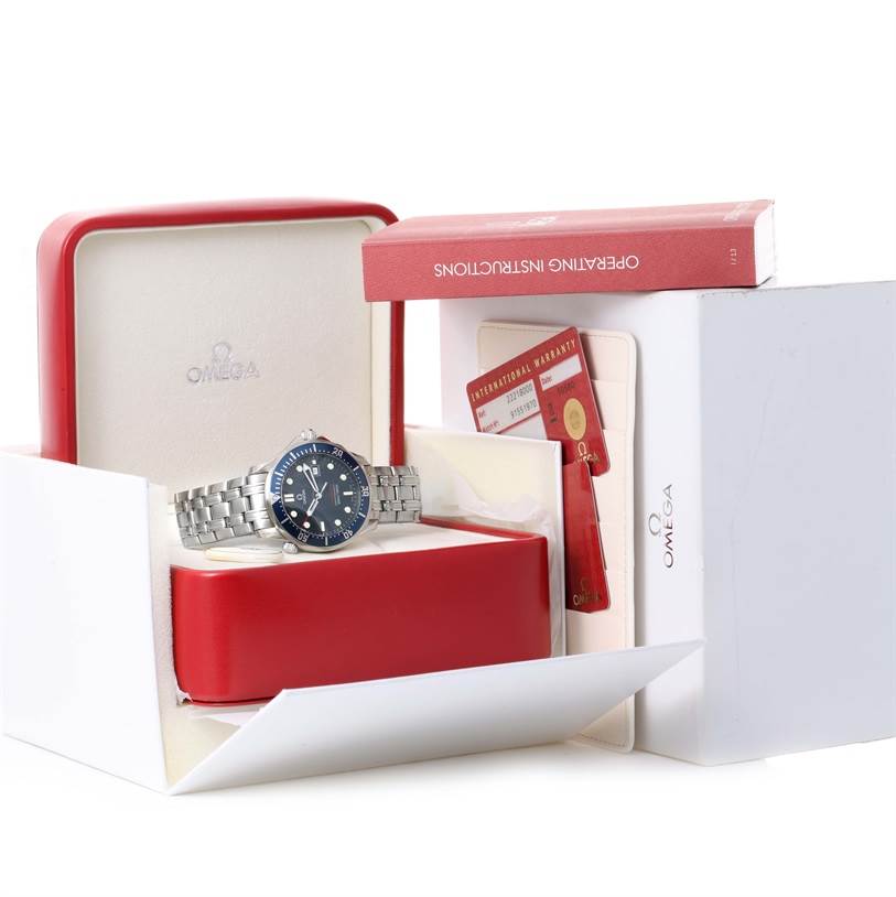 The Omega Seamaster 2221.80.00 Men's Stainless Steel Blue Dial 2221.80.00 Men's Stainless Steel Blue Dial watch is shown in its open case along with operating instructions and an international warranty card.