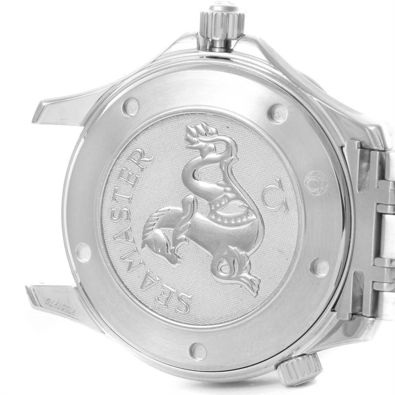 The image shows the case back of an Omega Seamaster 2221.80.00 Men's Stainless Steel Blue Dial 2221.80.00 Men's Stainless Steel Blue Dial watch at an oblique angle, highlighting the engraved logo and the crown.