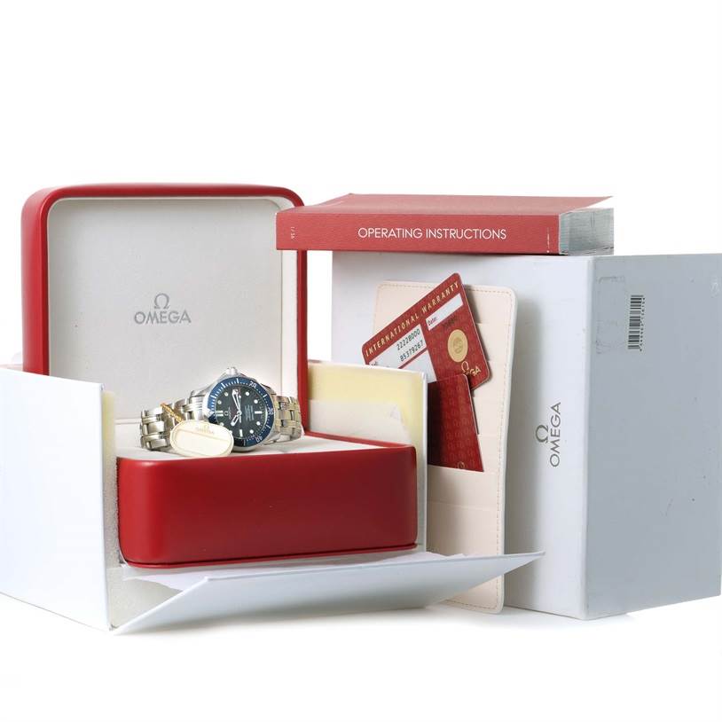 The image shows an Omega Seamaster 2222.80.00 Men
s Stainless Steel Blue Dial 2222.80.00 Men
s Stainless Steel Blue Dial watch from a front angle, displayed with its box, operating instructions, and warranty cards.