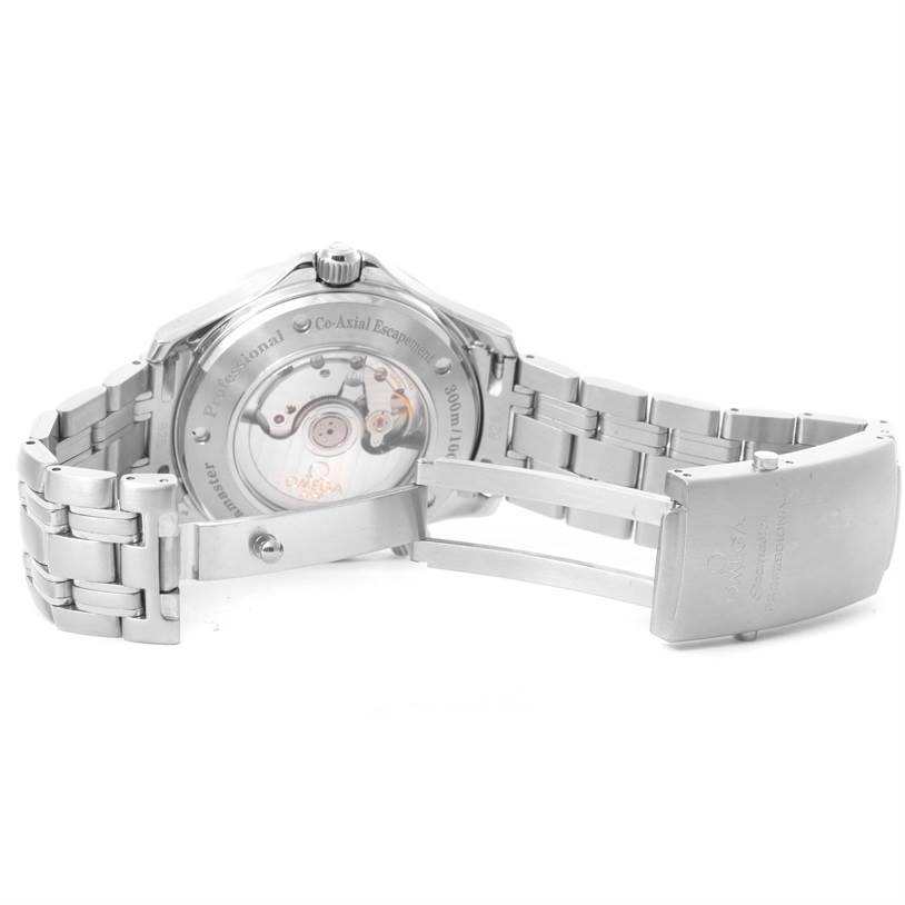 The image shows the back of an Omega Seamaster 2535.80.00 Men
s Stainless Steel Blue Dial 2535.80.00 Men
s Stainless Steel Blue Dial watch, highlighting the transparent case back and metal bracelet with the clasp open.