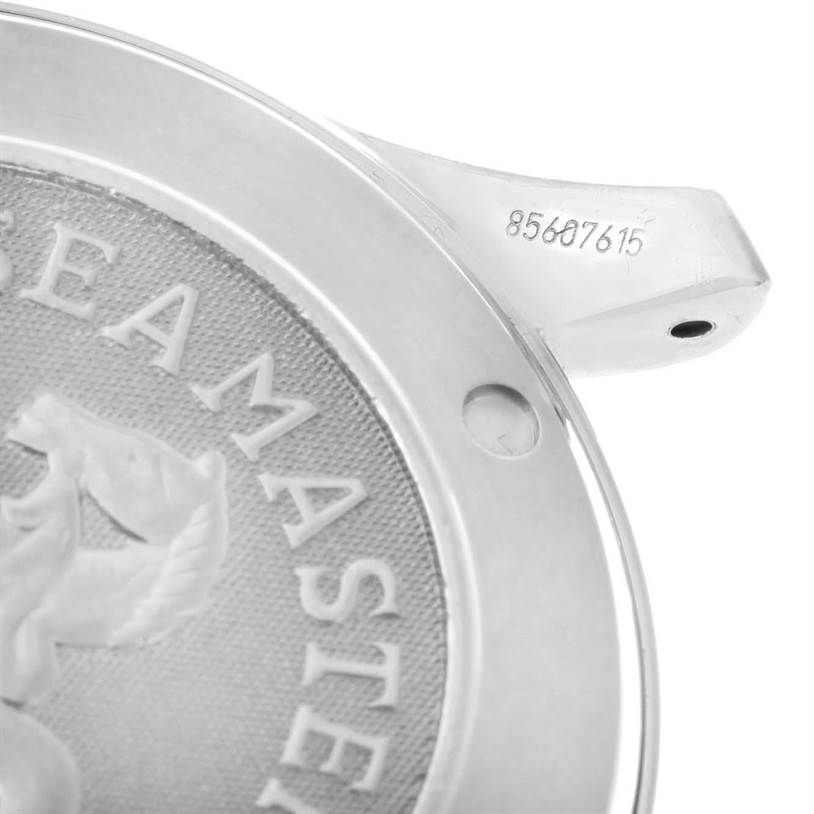 The image shows a close-up of the case back and lugs of an Omega Seamaster 2220.80.00 Men
s Stainless Steel Blue Dial 2220.80.00 Men
s Stainless Steel Blue Dial watch, featuring part of the embossed design and serial number.