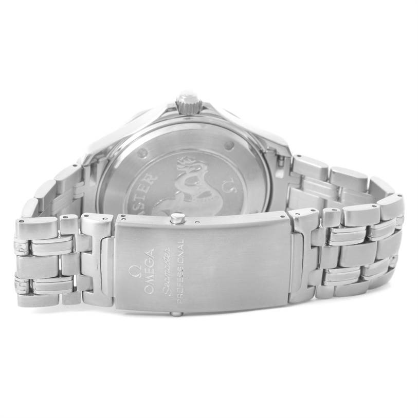 The image shows the back view of an Omega Seamaster 2220.80.00 Men
s Stainless Steel Blue Dial 2220.80.00 Men
s Stainless Steel Blue Dial watch, highlighting the case back and partially open bracelet with the clasp.