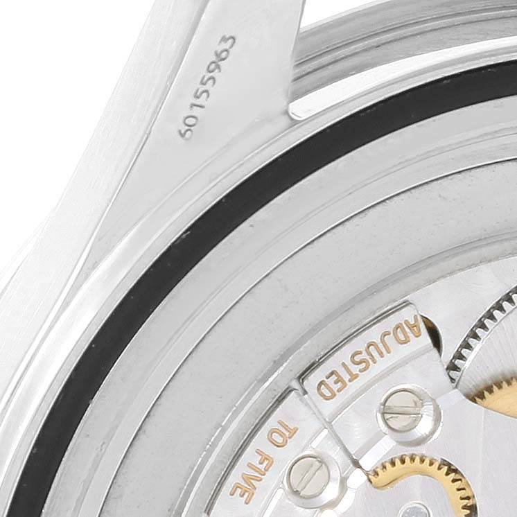 The image shows a partial view of the Omega Seamaster 2531.80.00 Men
s Stainless Steel Blue Dial 2531.80.00 Men
s Stainless Steel Blue Dial watch movement, featuring gears and part of the serial number.