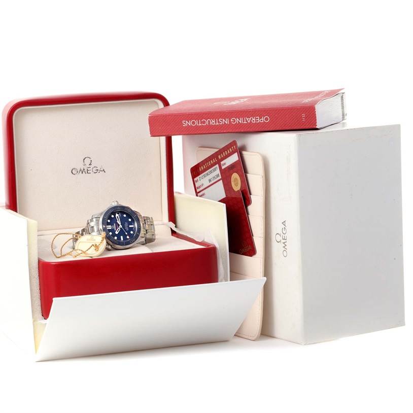 The Omega Seamaster 212.30.36.20.03.001 Men
s Stainless Steel Blue Dial 212.30.36.20.03.001 Men
s Stainless Steel Blue Dial watch is shown in its box, accompanied by operating instructions, warranty cards, and additional packaging.