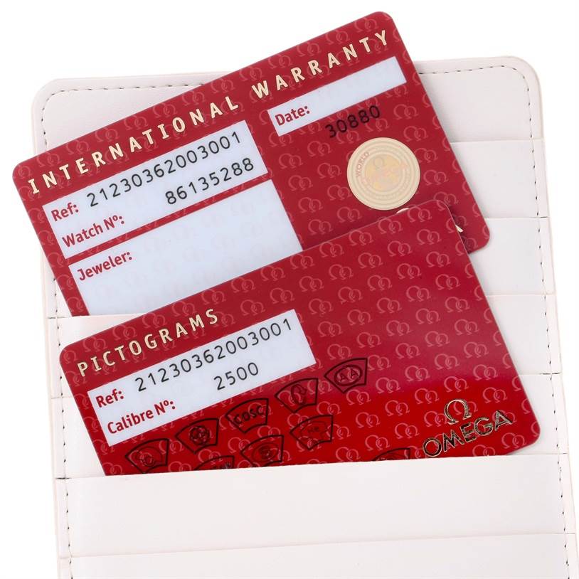 The image shows the international warranty and pictograms cards for the Omega Seamaster 212.30.36.20.03.001 Men
s Stainless Steel Blue Dial 212.30.36.20.03.001 Men
s Stainless Steel Blue Dial watch.