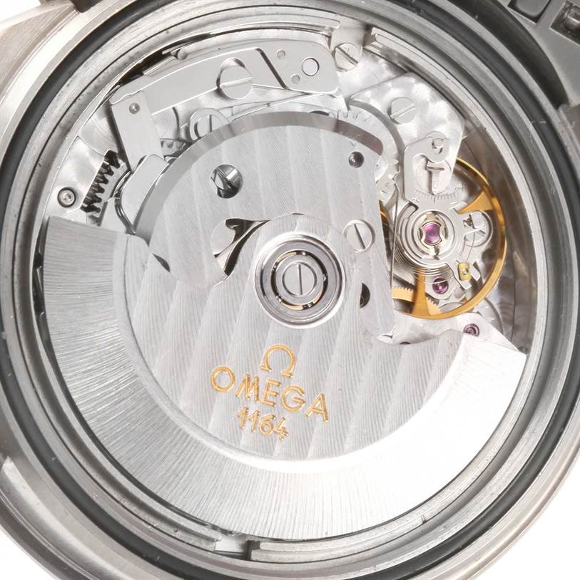 The image shows the internal mechanical movement of an Omega Seamaster 2296.80.00 Titanium Blue Dial 2296.80.00 Titanium Blue Dial watch, viewed from a close-up angle.