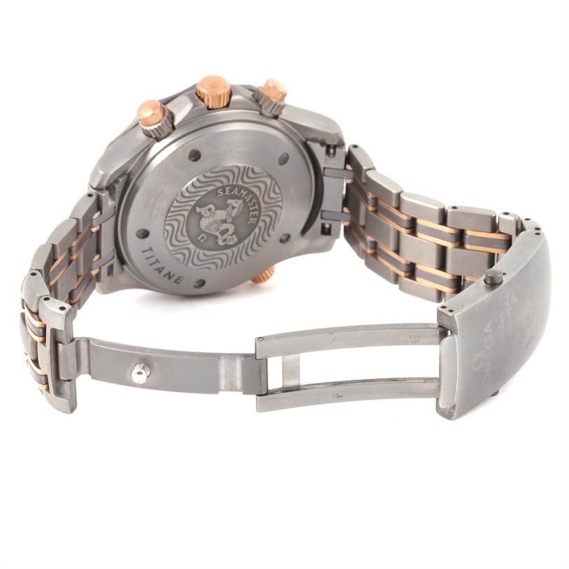 The image shows the case back, clasp, and bracelet of the Omega Seamaster 2296.80.00 Titanium Blue Dial 2296.80.00 Titanium Blue Dial watch with the clasp open.