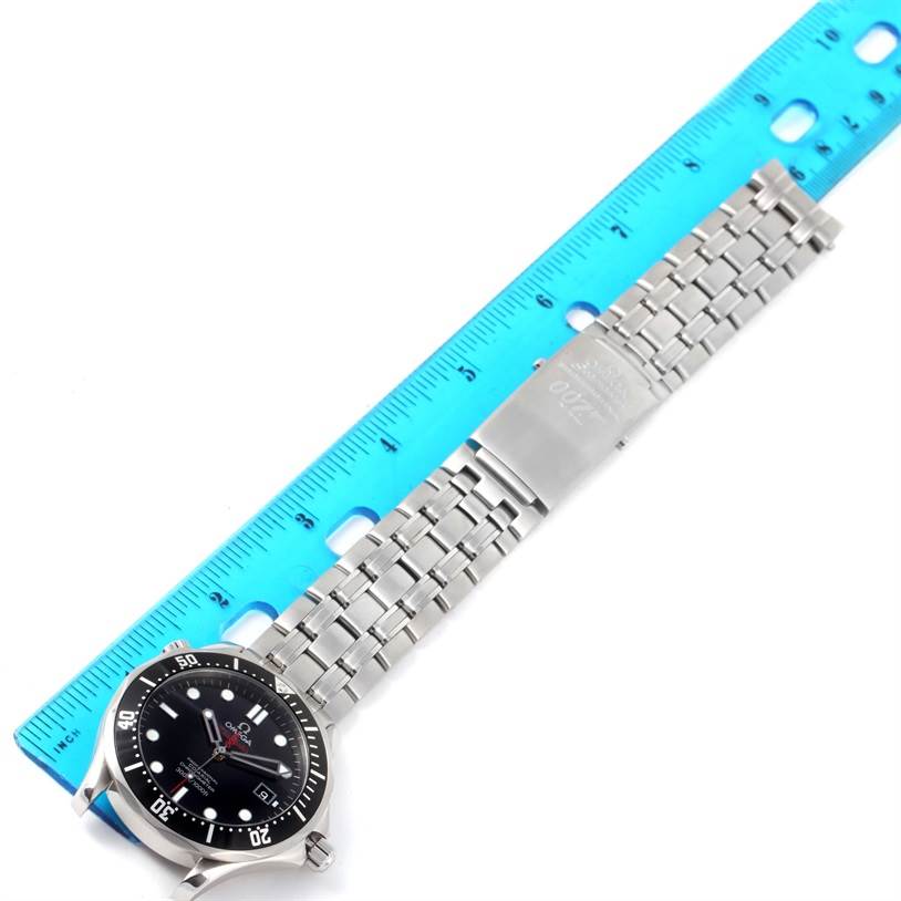 The image shows the Omega Seamaster 212.30.41.20.01.001 Men
s Stainless Steel Black Dial 212.30.41.20.01.001 Men
s Stainless Steel Black Dial watch laying flat with its face and full metal bracelet visible, next to a blue ruler for scale.